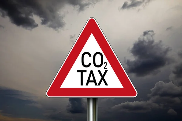 Traffic sign with climate protection, co2 emission and co2 tax with clouds in the background — Stock Photo, Image