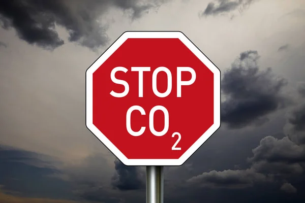 Stop sign with dark clouds and STOP CO2