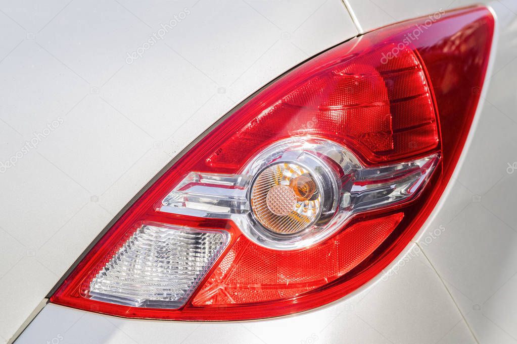 Close- up white car and Tail light