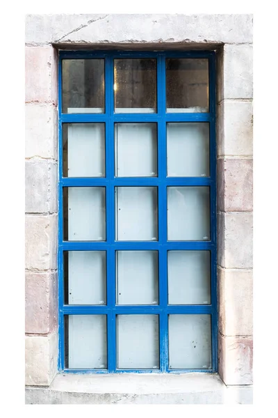 Blue wood window and stone wall