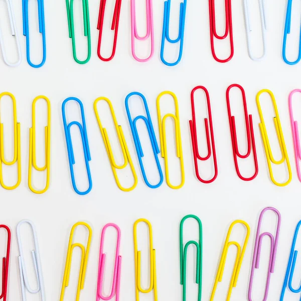 Metal paper clip isolated on a white background
