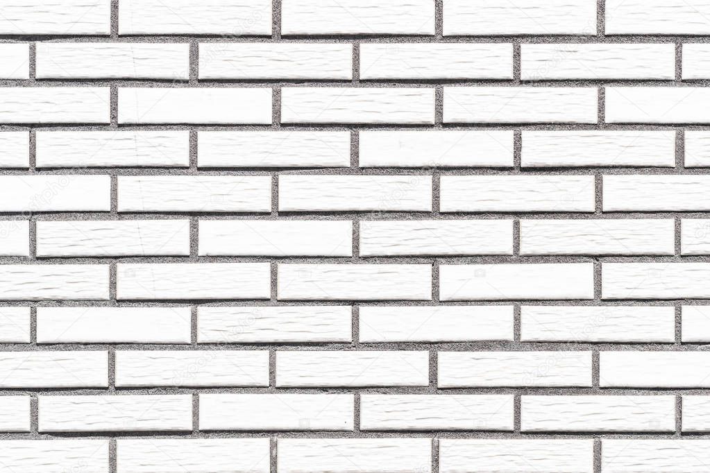 White stone brick wall tile background seamless