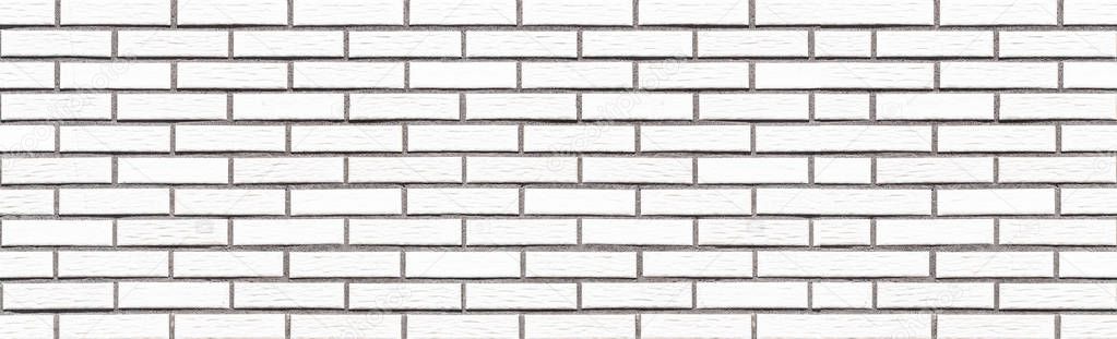 Panorama of White stone brick wall tile background seamless