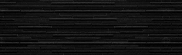 Panorama of Modern black stone tile wall pattern