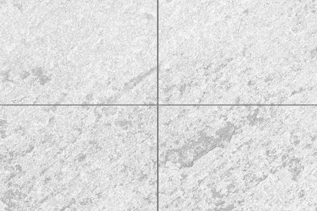 White granite stone tile floor pattern and seamless background