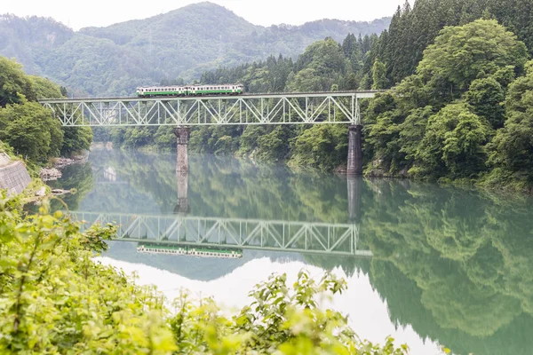Tadami railway line and Tadami River in summer season at Fukushima prefecture