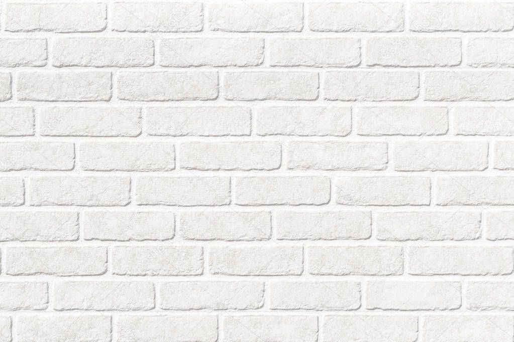 White stone brick wall texture and background seamless