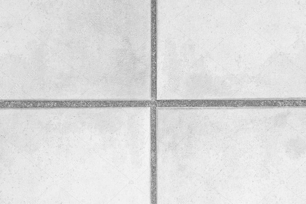 White stone tile floor pattern and seamless background