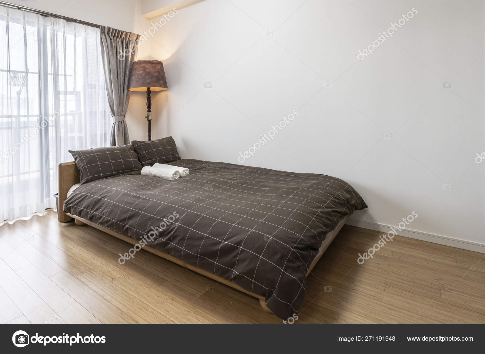 Queen Size Bed Small White Bedroom Stock Photo