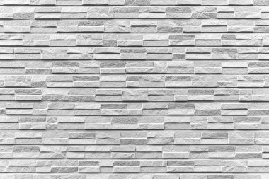 Arka plan ya da doku olarak taş duvar. Taş duvarın bir parçası, arka plan ya da doku için. Desen gri renk modern biçim tasarımı