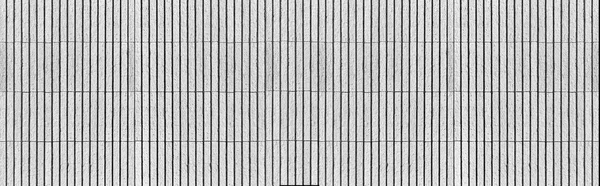 縞模様の質感とシームレスな背景を持つ白い石の壁のパノラマ — ストック写真