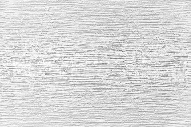 Çizgili ve pürüzsüz arkaplanı olan modern beyaz taş duvar