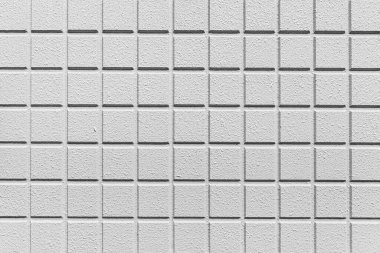 Çizgili ve pürüzsüz arkaplanı olan modern beyaz taş duvar