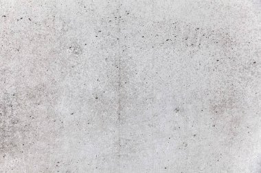 İç mekan için beyaz beton duvar ya da dış yüzey cilalı beton. Çimentoda kum ve taş tonu var., 