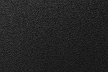 Lüks siyah deri dokular ve pürüzsüz bir arka plan.