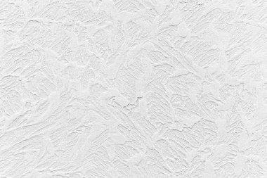 Çizgili ve pürüzsüz arkaplanı olan modern beyaz taş duvar