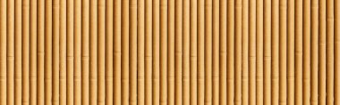 Bambu duvarından ya da bambu çit dokusundan Panorama of Close. Eski kahverengi ton doğal bambu çit dokusu arka planı