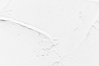 Beyaz desen ve arka planda boyanmış beton duvar.