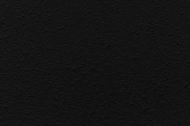 Sert beton duvar siyah dokuya boyanmış ve arkaplan pürüzsüz, beton duvar dokusu ve arka plan