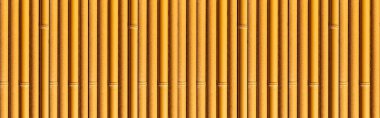 Bambu duvar panoraması ya da bambu çit dokusu. Eski kahverengi ton doğal bambu çit dokusu arka planı