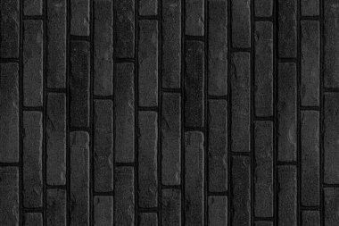 Siyah taş blok duvar pürüzsüz arkaplan ve desen dokusu