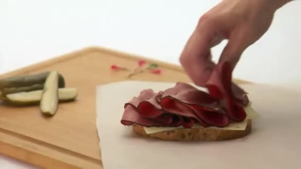 Man Making Pastrami Sandwich — Stock Video