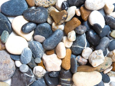 Açık arka plan düz yatıyordu deniz çok renkli taşlar desen