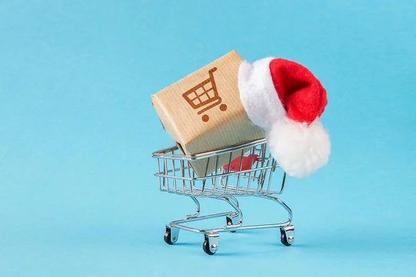 Belanja Online Diskon Natal Kotak Kardus Kemasan Paket Topi Santa — Stok Foto