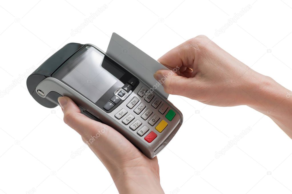debit card swiping through pos terminal in woman hands isolated on a white background