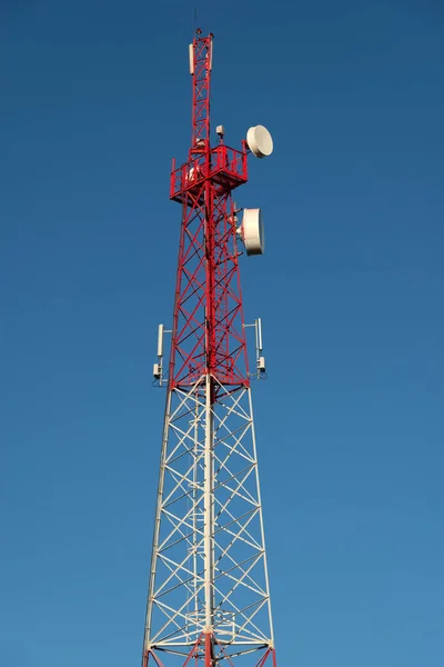 cellular tower on a background of blue sky