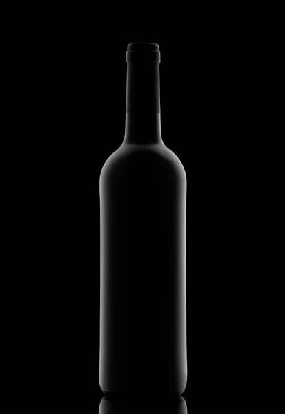 Silhouette of a bottle with wine on a black background — Stock Photo, Image