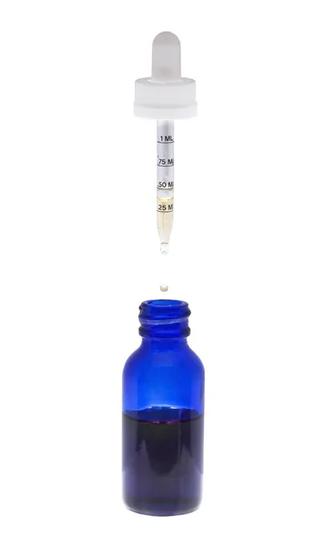 Eye Dropper Dripping Liquid Blue Bottle — Stock Photo, Image
