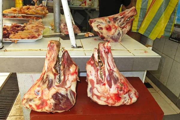 Pig heads at a peruvian market in Celendin, northern Peru