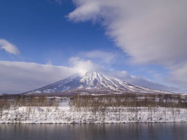 Mount Yotei, an active stratovolcano located in Shikotsu-Toya National Park, Hokkaido, Japan. It is one of the 100 famous mountains in Japan. clipart