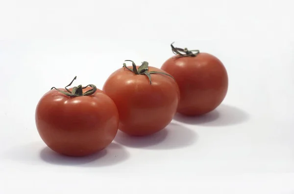 Three Tomatoes Line Shadows — Stock Photo, Image