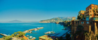 Sorrento, Italy - November 7, 2013: Elevated view of Sorrento and Bay of Naples. Sorrento is one of the towns of the Amalfi Coast,expensive and most beautiful European resort. clipart