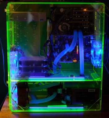 Transparent computer with liquid cooling and UV light clipart