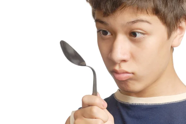 Young Hypnotist Spoon Distrorting His Glance — Stock Photo, Image