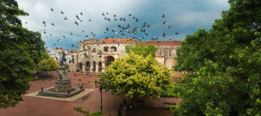 Doves flying over main square, Santo Domingo, Dominican Republic clipart