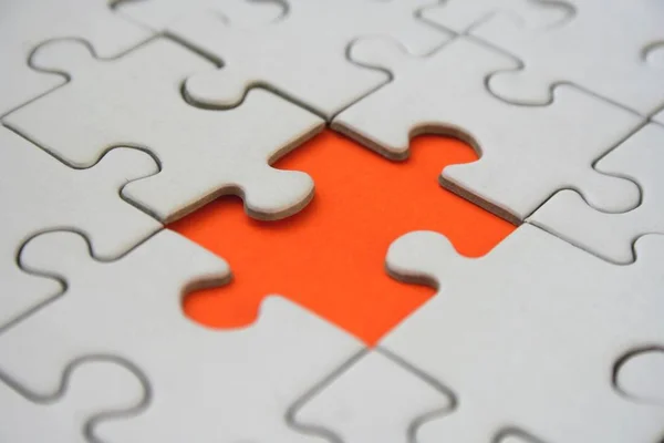 Wit Legpuzzelpatroon Met Één Mpty Oranje Legpuzzelelement — Stockfoto