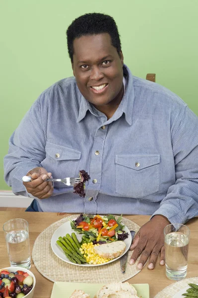 Obese Man Having Food — Stock Photo, Image