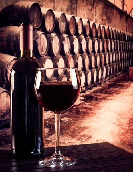 Red Wine Glass Bottle Old Wine Cellar Barrels Background — Stock Photo, Image