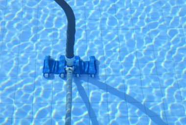 Swimming pooling cleaner and its hose clipart