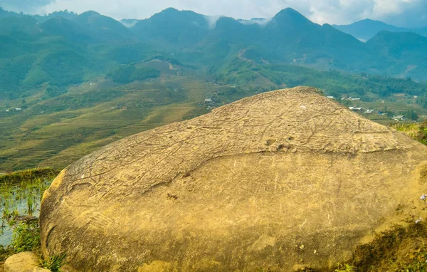 No one knows who engraved the boulders in the highlands of Sapa, but there are over 200 of them spread out in the landscape