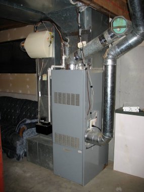 A shot of a modern furnace: a great HVAC-related image. clipart