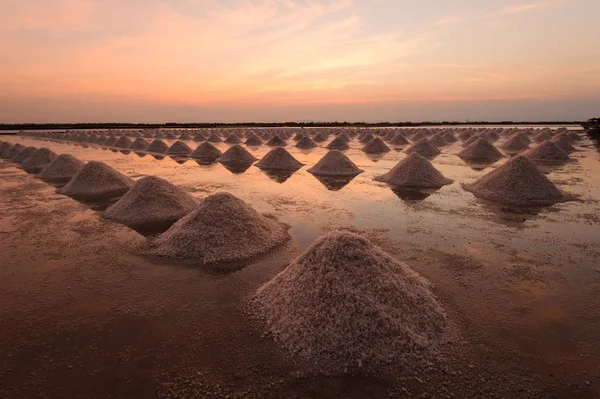 pile of salt in the salt pan at rural area of Thai coast.