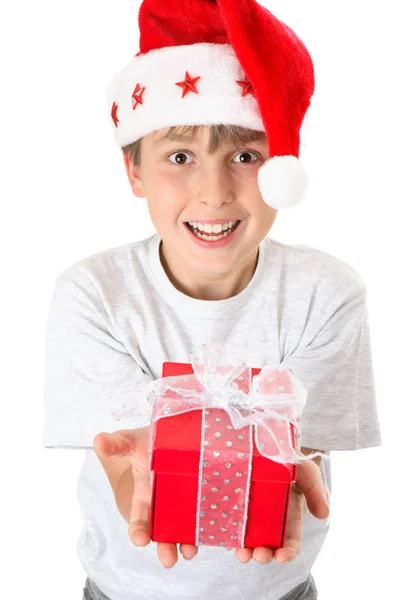 Ein Festliches Kind Verteilt Ein Geschenk Zur Weihnachtszeit — Stockfoto