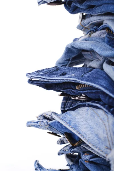 Stapel Gefalteter Jeans Isoliert Auf Weiß — Stockfoto