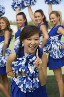 Group of young Cheerleader Cheering clipart