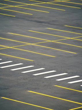 An empty parking lot freshly built and painted clipart